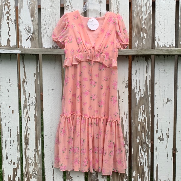 love shack fancy pink floral dress Mini by LoveShackFancy The Nabi Dress is a romantic mini silhouette crafted in a soft seaport pink floral print with an effortlessly feminine finish LoveShackFancy Brinley Dress in Rose